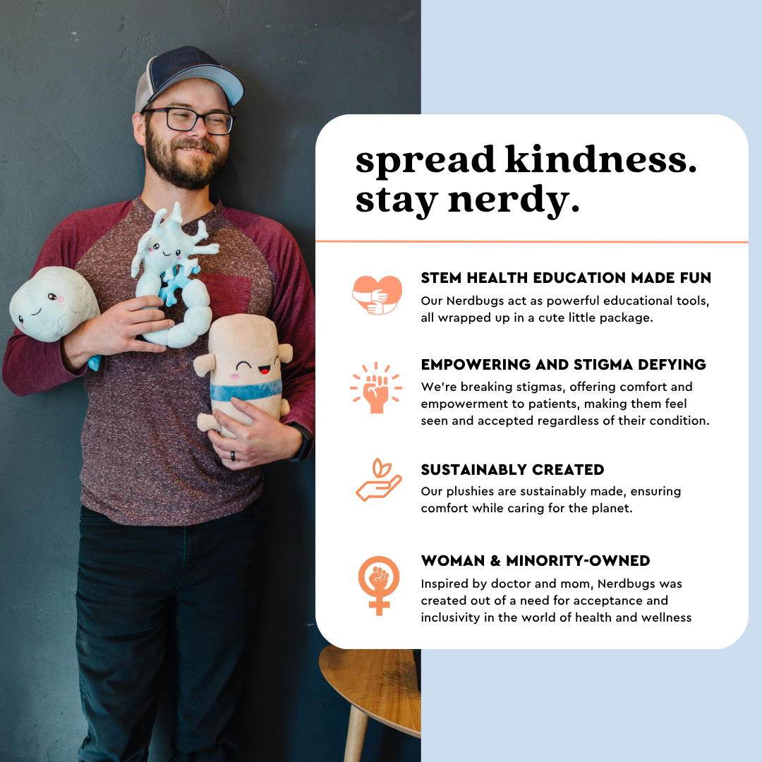 Man in a red sweater holding Nerdbugs plushies standing next to a sign that says Spread Kindness Stay Nerdy with info about the brand mission