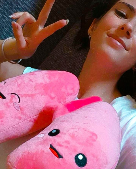 Lady making a peace sign with Nerdbugs Lung Organ Plushie