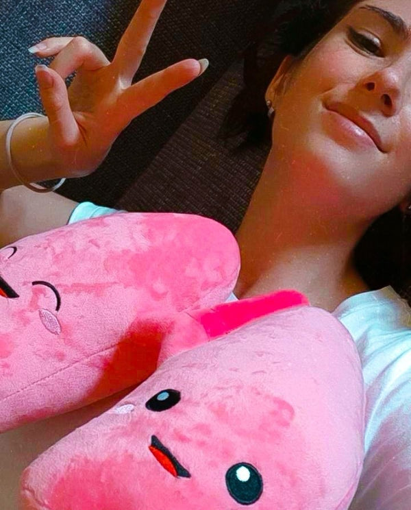 Lady making a peace sign with Nerdbugs Lung Organ Plushie