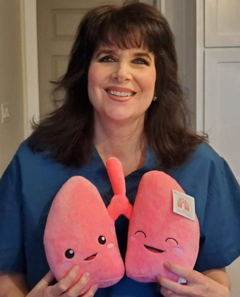 Lady holding a Nerdbugs Lung Organ Plushie
