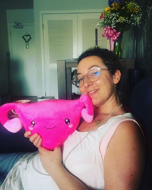 Lady holding a Nerdbugs Uterus Organ Plushie