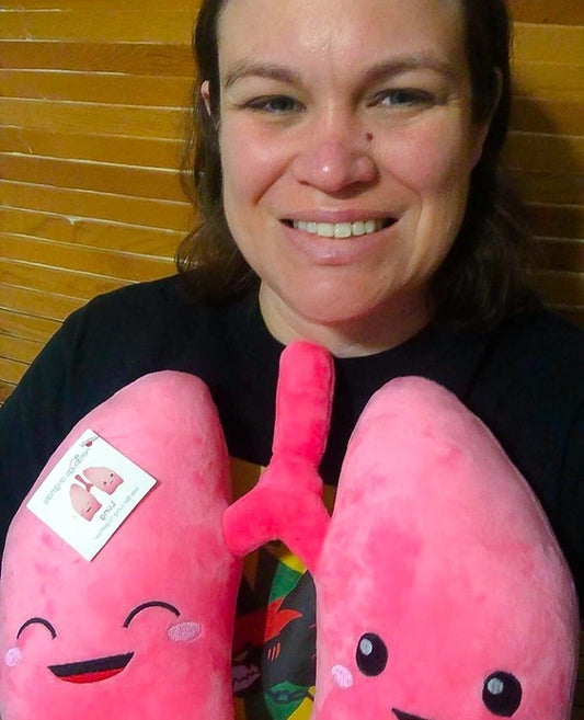 Lady holding a Nerdbugs Lung Plushie Organ