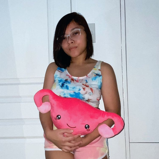 Lady holding a Nerdbugs Uterus Plushie Organ