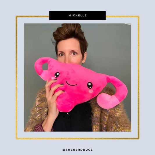 Lady holding a Nerdbugs Uterus Plushie Organ