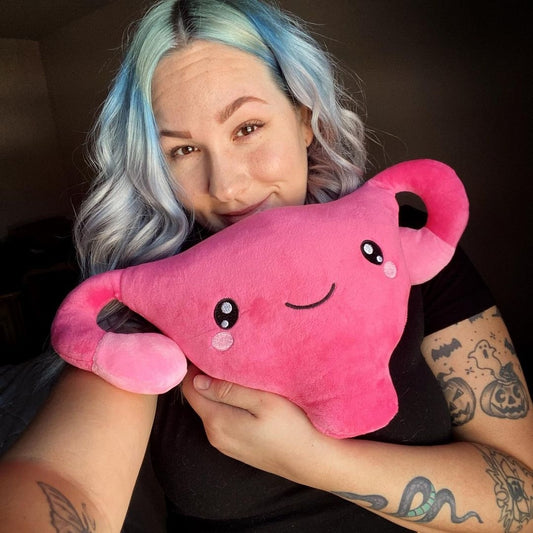 Lady holding a Nerdbugs Uterus Organ Plushie