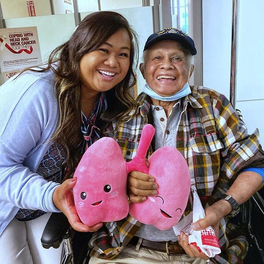 Father and Daughter holding a Nerdbugs Lung Plushie Organ
